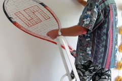 14- Tennisschläger mit Ball