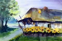 Bauernhof mit Sonnenblumen